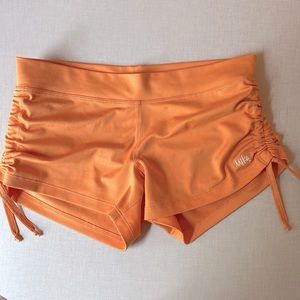 MIKA YOGA • Hot Yoga | Pole | Swim Shorts Orange • Size M